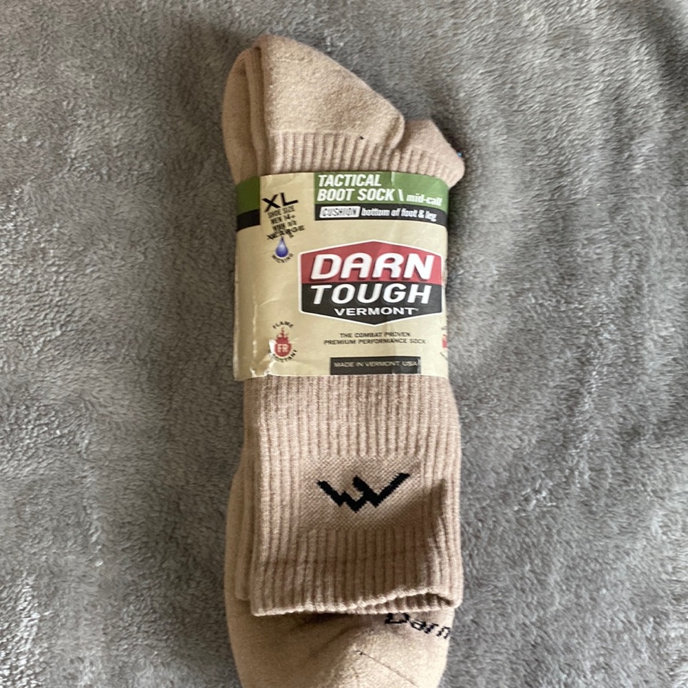 Never worn Darn Tough sock Boot socks.